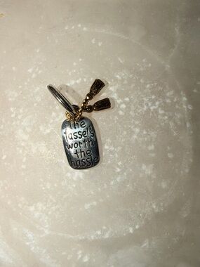 Brighton two-tone charm with gold tassels